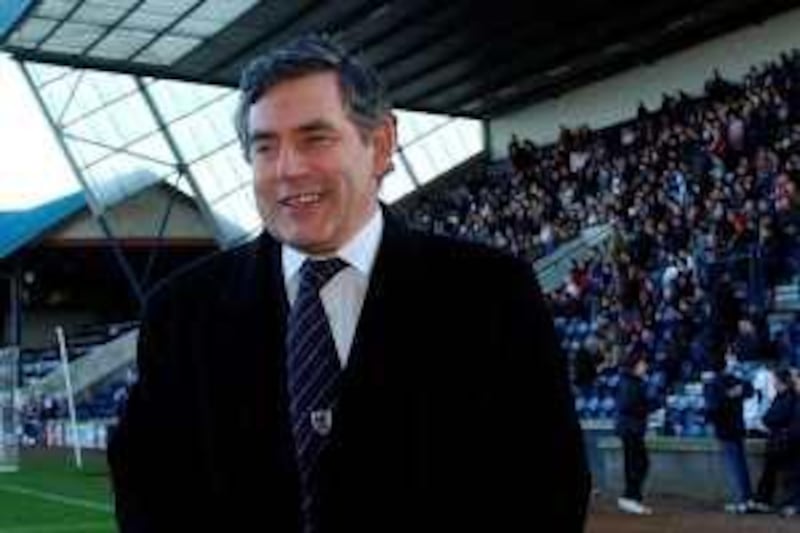 Britain's Chancellor of the Exchequer Gordon Brown at the Raith Rovers v Stirling match in Kirkcaldy, Saturday January 14, 2006. Mr Brown joined a host of celebrities at Raith Rover's gala day to mark a fans buyout of the club. See PA story SPORT Brown. PRESS ASSOCIATION Photo. Photo credit should read: Danny Lawson /PA.