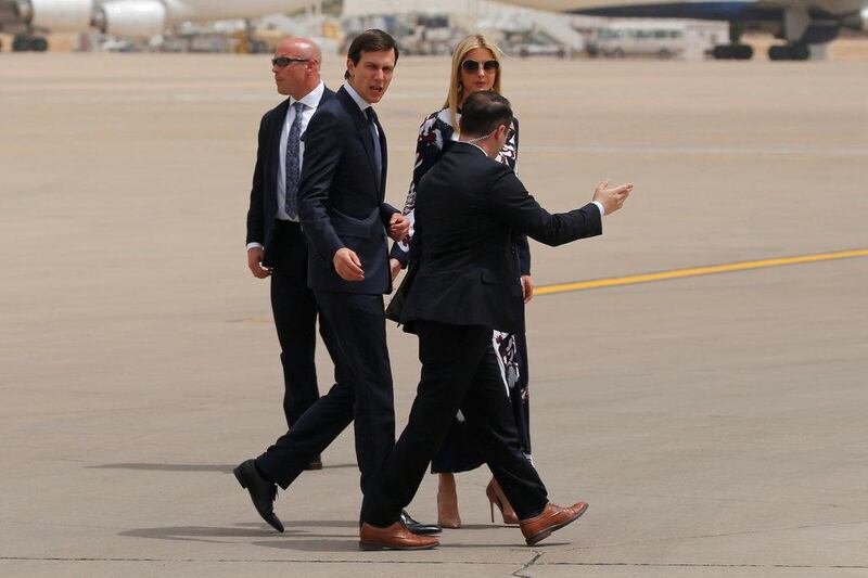 White House senior advisor Jared Kushner and his wife Ivanka Trump walk on the tarmac after arriving with US president Donald Trump aboard Air Force One. Jonathan Ernst / Reuters