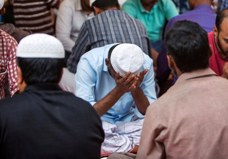 DUBAI,  UNITED ARAB EMIRATES, 20 May 2018 - Muslims praying before  iftar at Lootah Masjid Mosque, Deira, Dubai. Leslie Pableo for The National  for Ramola Talwar story