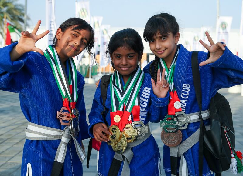 Young jiu-jitsu competitors arrive at the festival