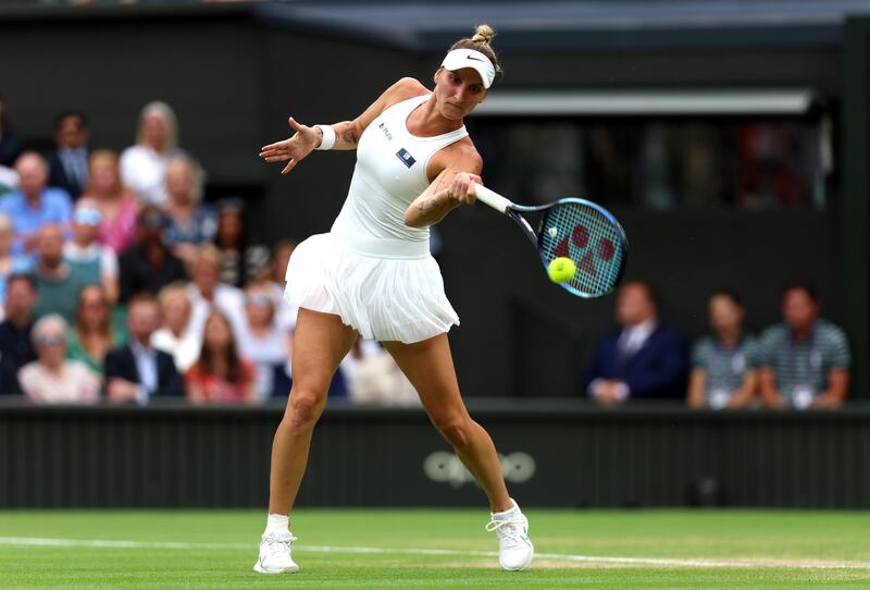Marketa Vondrousova plays a forehand against Ons Jabeur during the Wimbledon final. Getty