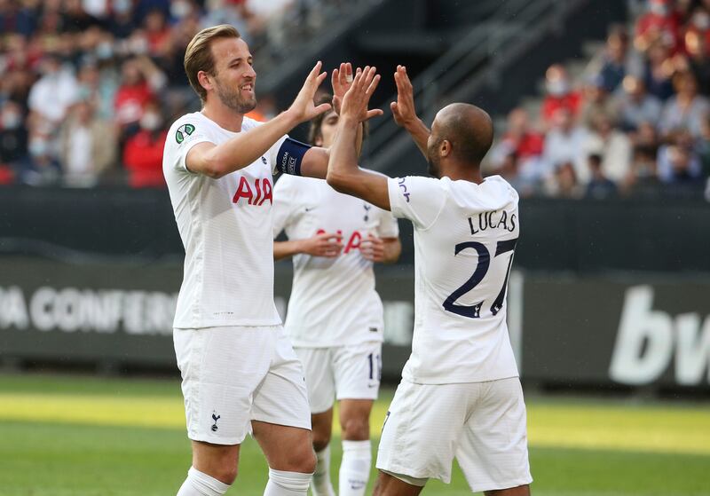 RENNES, FRANCE - SEPTEMBER 16: Harry Kane and Lucas Moura of Tottenham Hotspur celebrate their side's first goal, an own goal by Loic Bade of Rennes (not pictured) during the UEFA Europa Conference League group G match between Stade Rennes and Tottenham Hotspur at  on September 16, 2021 in Rennes, France. (Photo by John Berry / Getty Images)