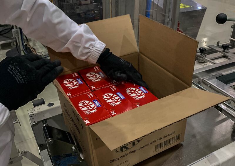 The KitKats are boxed up to be sent to distributers. 