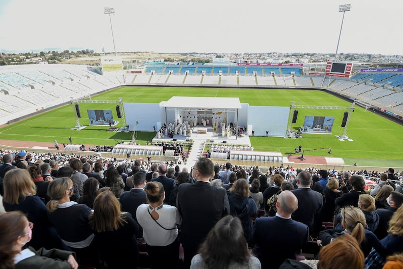 Thousands of faithful flocked to the football stadium in Nicosia to attend mass led by Pope Francis. EPA / ALESSANDRO DI MEO