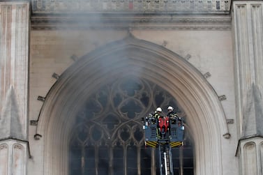 French firefighters battle a blaze at the Cathedral of Saint Pierre and Saint Paul in Nantes, France, July 18, 2020. Reuters