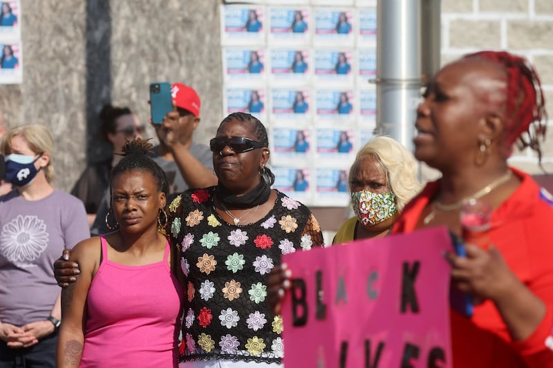 Mourners gather for a vigil for victims of the shooting. Reuters