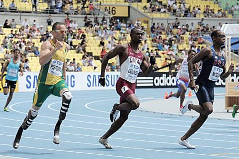 Oscar Pistorius, the South African sprinter known as "Blade Runner", finsihed third in his heat to reach the semi-finals of the 400m at the World Championships in Daegu.