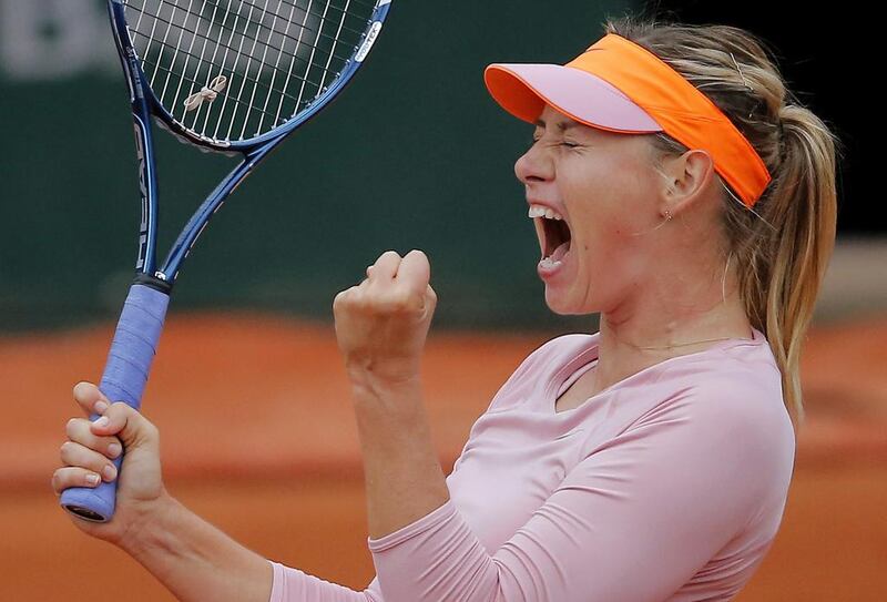 Russia’s Maria Sharapova reacts as she plays Australia’s Samantha Stosur during their fourth round match of the French Open tennis tournament at the Roland Garros stadium, in Paris, France. Michel Spingler / AP