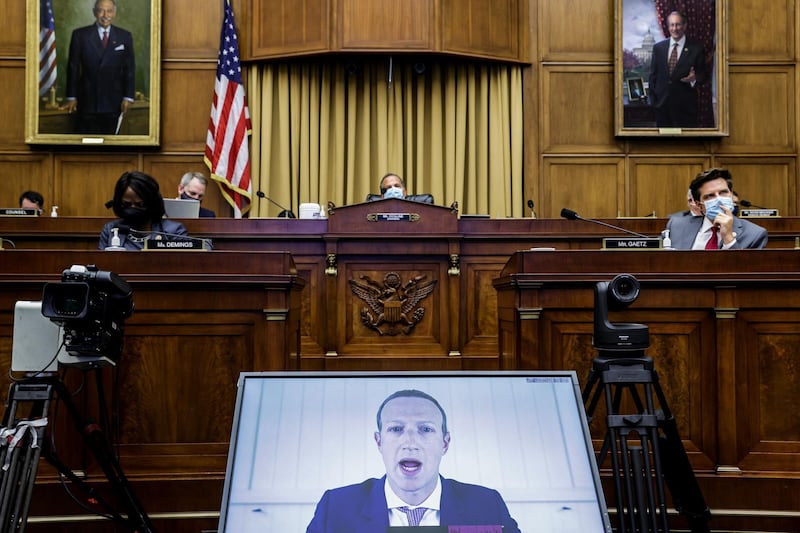 TOPSHOT - Facebook CEO Mark Zuckerberg testifies before the House Judiciary Subcommittee on Antitrust, Commercial and Administrative Law on "Online Platforms and Market Power" in the Rayburn House office Building on Capitol Hill in Washington, DC on July 29, 2020. / AFP / POOL / Graeme JENNINGS
