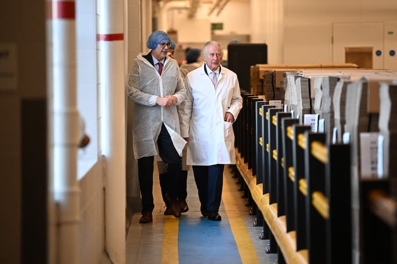 King Charles tours the headquarters of Kellogg's. AFP
