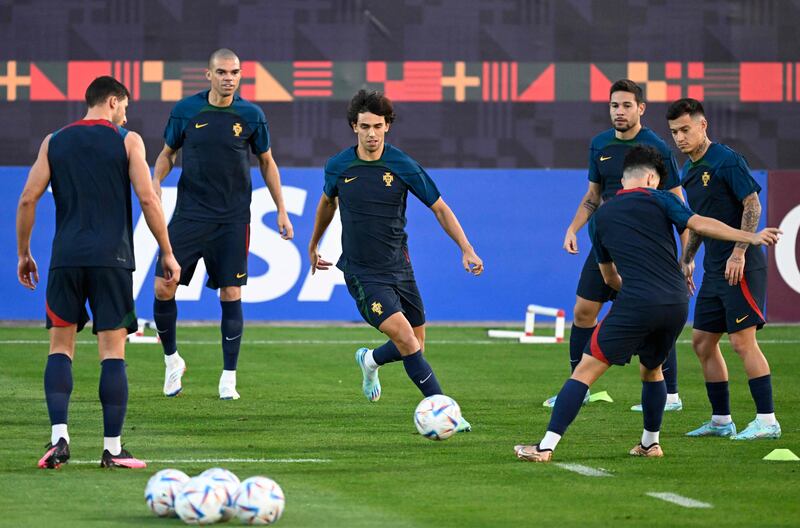 Portugal's Joao Felix and his teammates during training. AFP