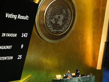 The results of a vote on a resolution for the UN Security Council to reconsider and support the full membership of Palestine into the United Nations is displayed during a special session of the UN General Assembly, at UN headquarters in New York City on May 10, 2024.  A veto from the United States during an April 18, 2024 UN Security Council meeting previously foiled the Palestinians' drive for full UN membership.  (Photo by Charly TRIBALLEAU  /  AFP)