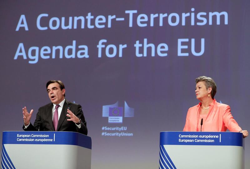 epa08872132 European Commissioner for Promoting our European Way of Life Margaritis Schinas (L) and European Home Affairs Commissioner Ylva Johansson (R) give a press conference on the Security Union progress report on Counter-Terrorism Agenda and on Europol Regulation at the European Commission in Brussels, Belgium, 09 December 2020.  EPA/STEPHANIE LECOCQ / POOL