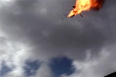 File Photo: An image grab taken from a video shows a Houthi drone exploding above Yemen's Al Anad air base on January 10, 2019. AFP