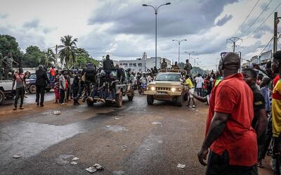 epa08611759 Malians cheer as Mali military enter the streets of Bamako, Mali, 18 August 2020. Mali military have seized Mali President Ibrahim Boubakar Keita in what appears to be a coup attempt.  EPA/HADAMA DIAKITE