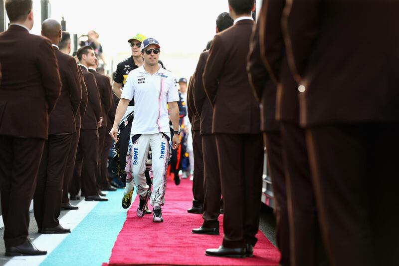 Sergio Perez of Mexico and Force India walks to the drivers parade before the Abu Dhabi Formula One Grand Prix at Yas Marina Circuit. Getty