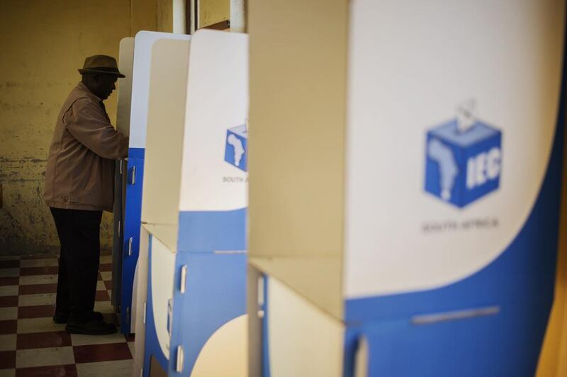 A South African man prepares his ballot before vote as part of the general elections, on May 7, 2014 at the Qunu Junior Secondary school in Qunu, South Africa. Some 22,000 voting stations were operating at schools, places of worship, tribal authority sites and hospitals, and several dozen vehicles serving as mobile voting stations were heading to remote areas to meet people. Gianluigi Guercia / AFP