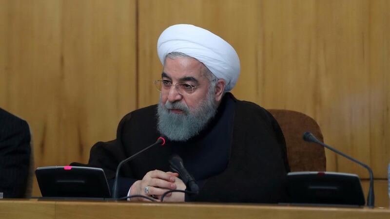 Hassan Rouhani, Iran's president, responds to U.S sanctions in a cabinet meeting in Tehran Iranian Presidency Office via AP