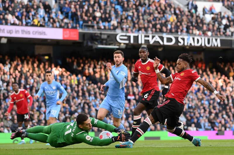 MAN CITY RATINGS: Ederson - 7: Out quickly to save at feet of Fred and prevent United grabbing instant first-half leveller. No chance with sublime Sancho finish. Getty