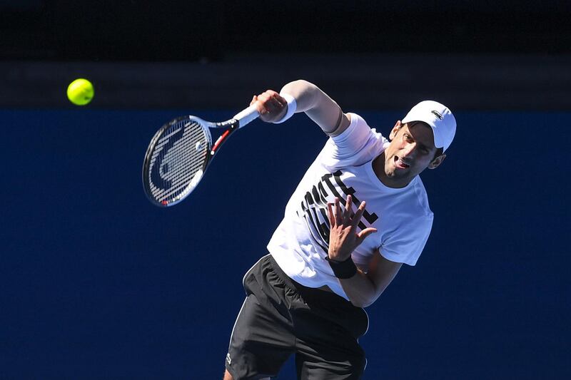 epa06437294 Novak Djokovic of Serbia in action during a practice session ahead of the Australian Open tennis tournament, in Melbourne, Victoria, Australia, 14 January 2018. The Australian Open starts on 15 January.  EPA/LUKAS COCH  AUSTRALIA AND NEW ZEALAND OUT