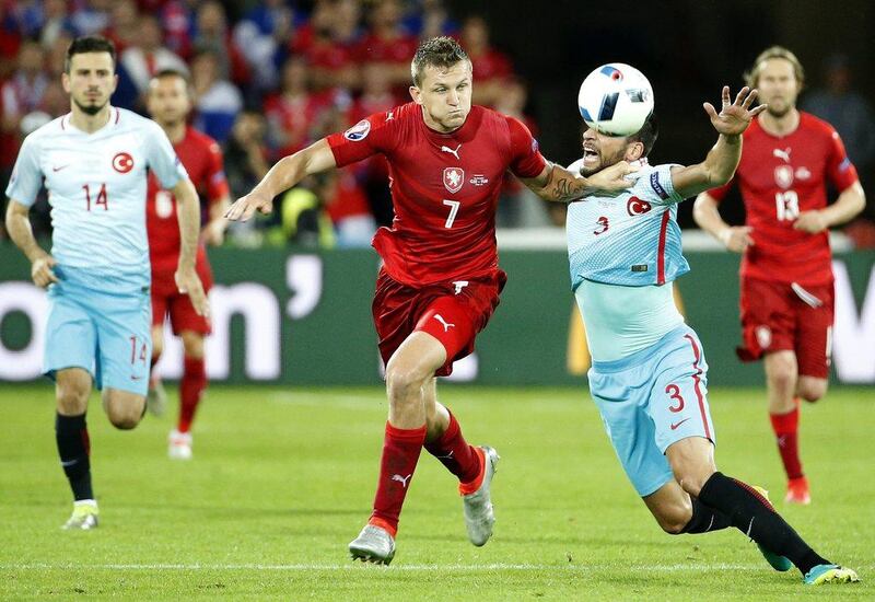 Hakan Balta of Turkey (R) and Tomas Necid of Czech Republic (L) in action during the UEFA EURO 2016 group D preliminary round match between Czech Republic and Turkey at Stade Bollaert-Delelis in Lens Agglomeration, France, 21 June 2016. EPA/SHAWN