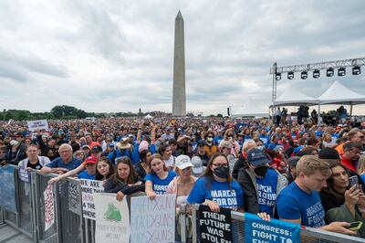 Around 30,000 demonstrators coalesced round the Washington Monument. Bloomberg