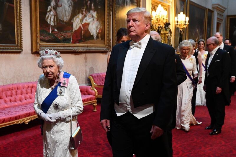 Britain's Queen Elizabeth and US President Donald Trump arrive at the State Banquet at Buckingham Palace in London, Britain. Reuters