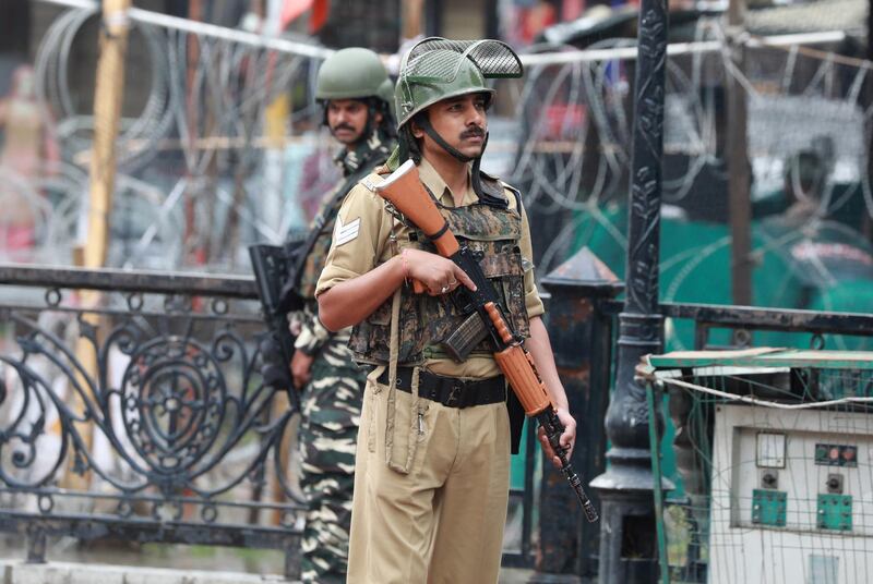 epa06931819 Indian paramilitary soldiers stand guard in Srinagar, the summer capital of Indian Kashmir, 07 August 2018. Four Indian army soldiers, including an officer, and two militants were killed in an ongoing operation along the Line of Control (LoC) in the Gurez area of north Kashmirâ€™s Bandipora district. An army officer said that army soldiers intercepted a group of infiltrators near Bakhtor area of Gurez along LOC, according local news reports.  EPA/FAROOQ KHAN