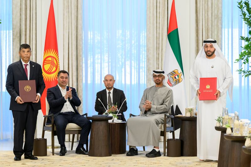 Dr Mohamed Al Kaabi, chairman of the UAE General Authority of Islamic Affairs and Endowments, and Almaz Baketaev, Minister of Finance of Kyrgyzstan, exchange agreements. 