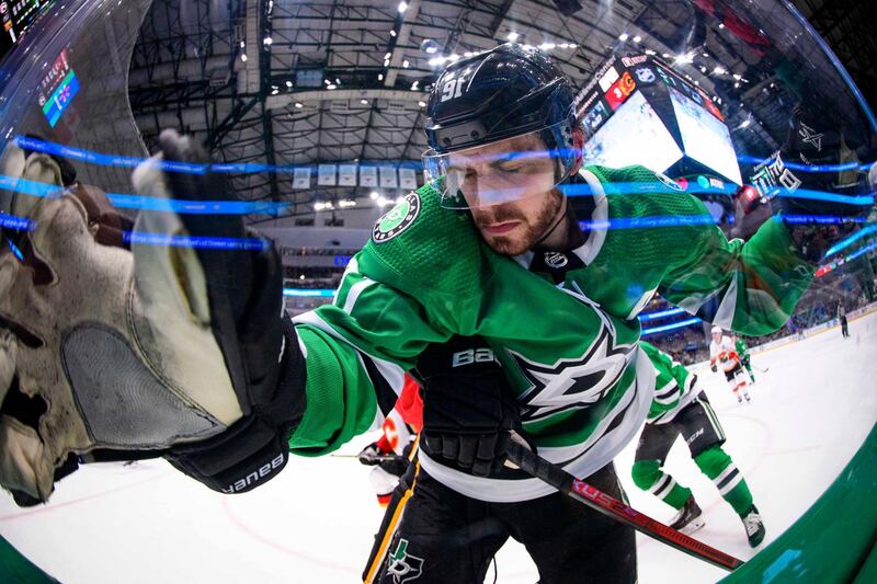 Dallas Stars center Tyler Seguin is checked into the glass during the second period against the Calgary Flames at the American Airlines Center in Texas on Sunday, December 22. USA TODAY Sports