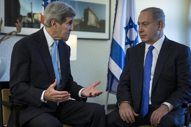 Prime Minister of Israel Benjamin Netanyahu meets with US secretary of state John Kerry in Berlin. Carlo Allegri / AP Photo



