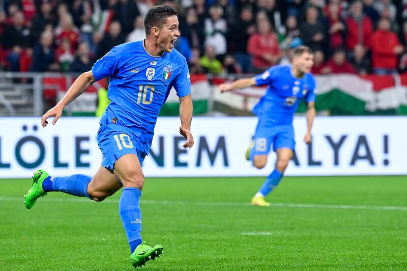 Giacomo Raspadori of Italy celebrates scoring the opening goal in the Nations League League A, Group 3 match against Hungary at Puskas Arena, Budapest on September 26, 2022. EPA