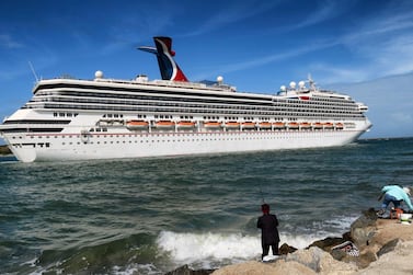 The Carnival Liberty leaving Port Canaveral in Florida in March 2020. The company expects to burn through about $600m a year in the first quarter, chief executive Arnold Donald said. AP Photo