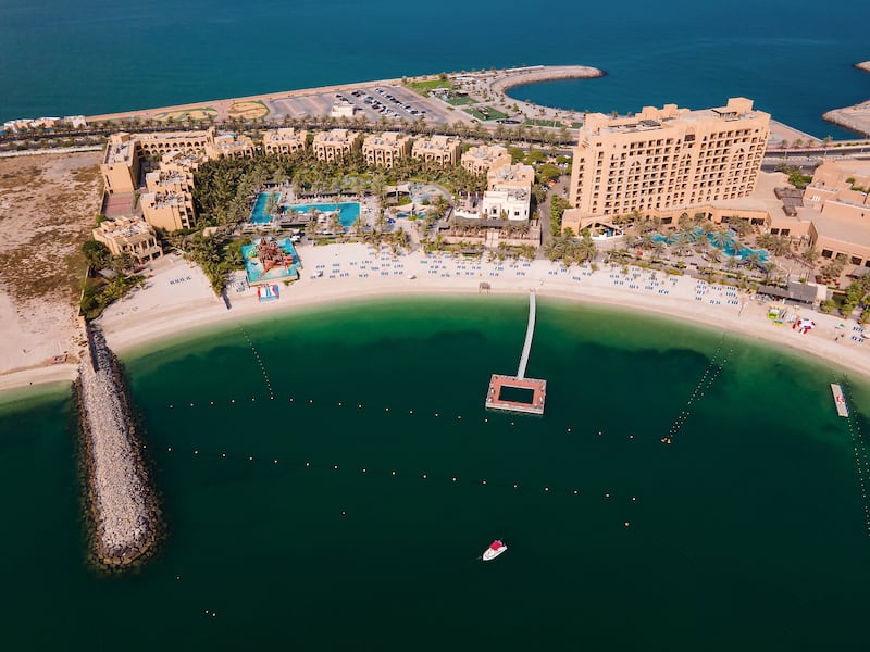 Aerial view of beach road and resorts of Al Marjan Island in Ras Al Khaimah. Getty