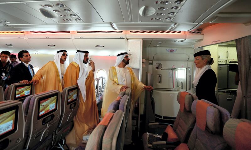 Ruler of Dubai Sheikh Mohammed bin Rashid takes a tour of the Emirates A380 airliner during the opening ceremony of the Dubai Airshow on November 17, 2013. AFP