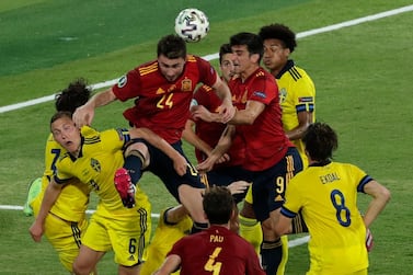 Spain's Aymeric Laporte goes for a header during the Euro 2020 Group E match between Spain and Sweden, at La Cartuja stadium in Seville, Spain. AP