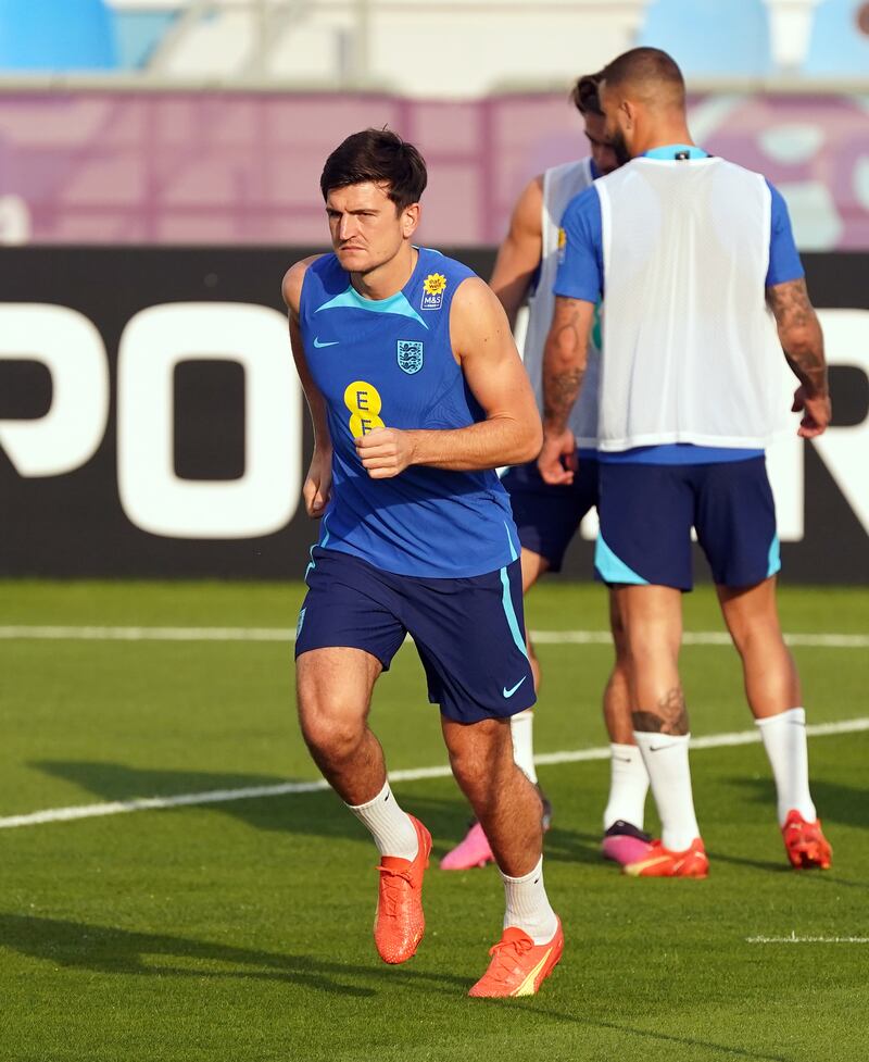 England's Harry Maguire warms up during training in Qatar ahead of the quarter-final against France. PA