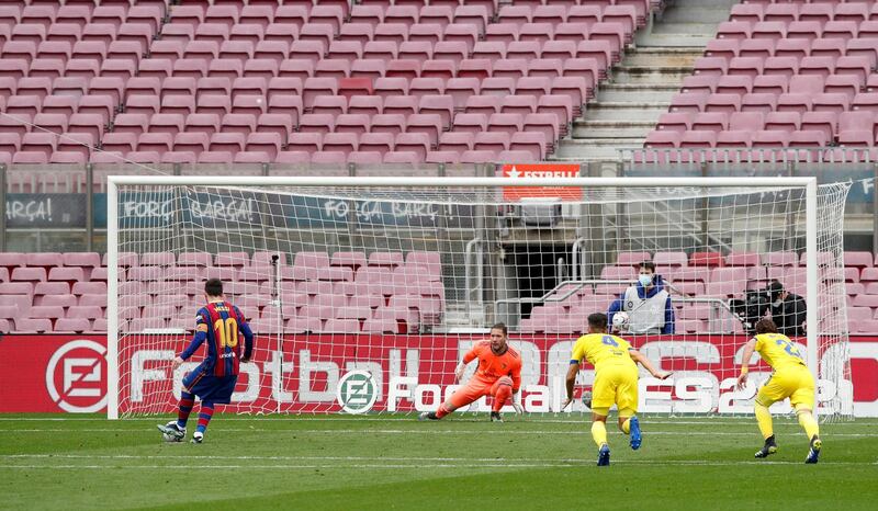 Barcelona's Lionel Messi scores from the penalty spot. Reuters