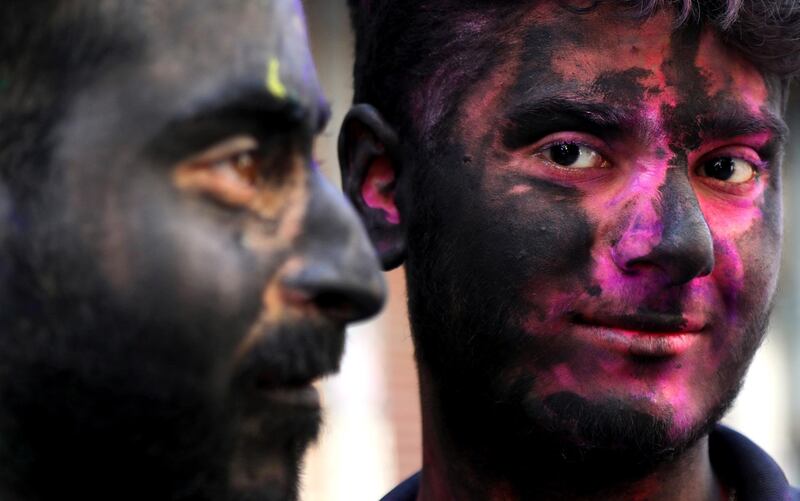 Indian people are smeared in powdered colours during Holi festival celebrations in Jammu, India, 09 March 2020. Holi is an ancient Indian festival also known as the 'Festival of Colour,' held to mark the arrival of spring.  EPA