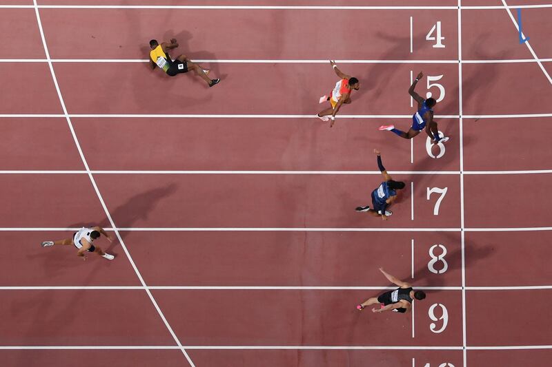 USA's Grant Holloway crosses the finish line to win the men's 110m hurdles final at the Athletics World Championships in Doha on Wednesday, October 2. AFP