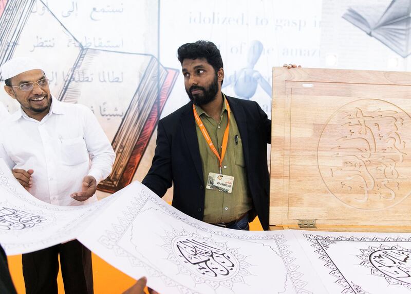 SHARJAH, UNITED ARAB EMIRATES. 30 October 2019. 
Cartoonist and Guinness record holder  M Dileef’s latest Guinness pursuit involves creating the world’s largest handwritten Quran. His dream is to write the holy text that runs a kilometre long.
His quran is on display at the 38th Sharjah International Book Fair edition at Expo Centre Sharjah, offering more than 1.6 million titles to publishers as well as eager readers of all ages.

(Photo: Reem Mohammed/The National)

Reporter:
Section: