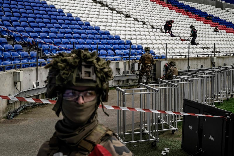 Police officers, military personnel, rescue workers and firefighters take part in an exercise simulating a terrorist attack at the Groupama Stadium in Decines-Charpieu, eastern France. AFP