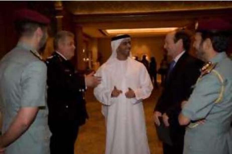 United Arab Emmirates - Abu Dhabi - Oct. 21 - 2008 : His Highness Lieutenant General Sheikh Saif Bin Zayed Al Nahyan, UAE Minister of Interior (center) chat (from left to right) with Lieutenant Col. Fawaz Khalil Al Karaeen, Sir Ken Knight from Chief Fire & Rescue Adviser, Michael A. Sheehan, President and CEO of Lexington Security Group and Mayor General Nasser Al Nuaimi, during the World Security Forum at Emirates Palace Hotel. ( Jaime Puebla / The National ) *** Local Caption ***  JP03 WORLD SECURITY FORUM.jpg