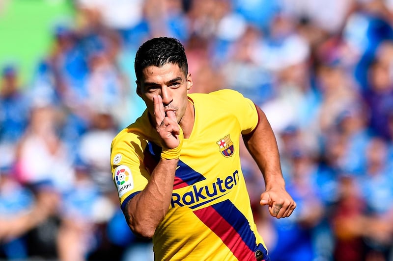 Luis Suarez celebrates scoring against Getafe in September 2019. AFP