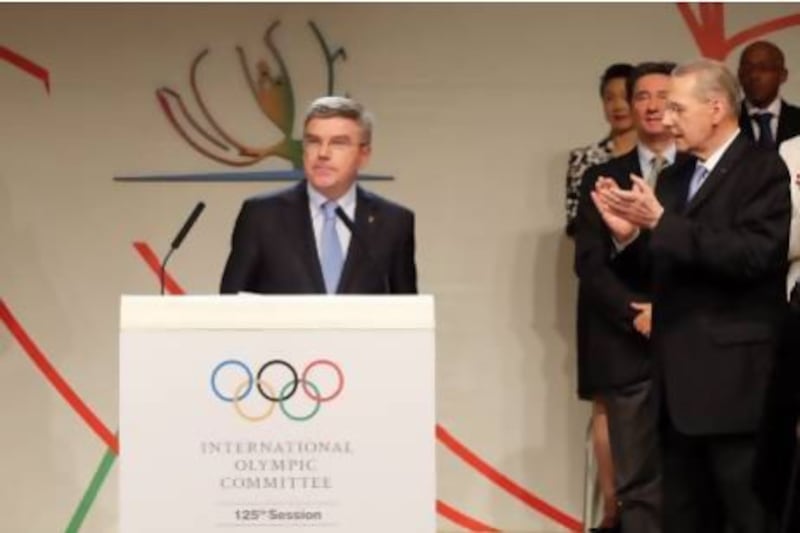 Thomas Bach is announced as IOC president by the outgoing Jacques Rogge, right, on Tuesday. Ian Walton / Getty Images