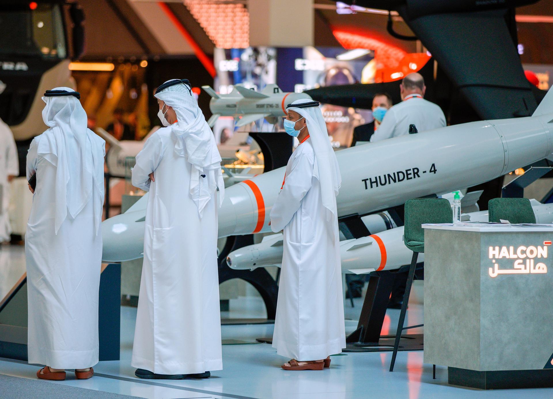 Abu Dhabi, United Arab Emirates, February 22, 2021.  Idex 2021 Day 2.Visitors inspect the Thunder-4 at the Halcon stand.Victor Besa / The NationalSection:  NA