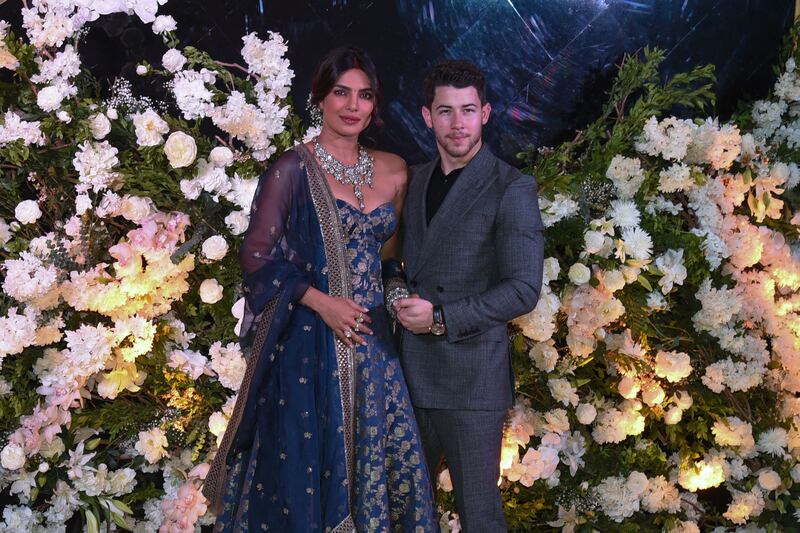 Chopra and Jonas at their wedding reception in Mumbai, on December 19, 2018. They got married in a ceremony on December 1 that year in a lavish palace hotel wedding in Udaipur, India. AFP