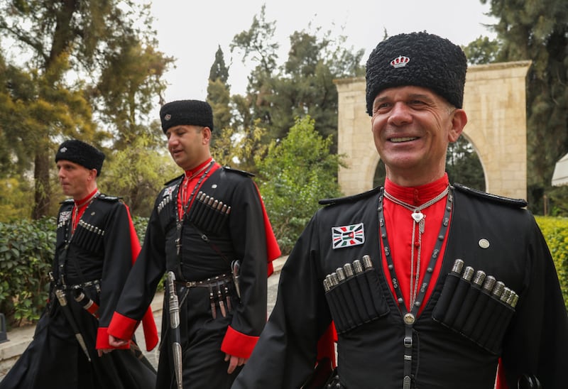The Circassian honour guard's commander Ayman Yacoub walks with other members of the formation at the royal court in Amman, Jordan January 29, 2023.  REUTERS / Alaa Al Sukhni