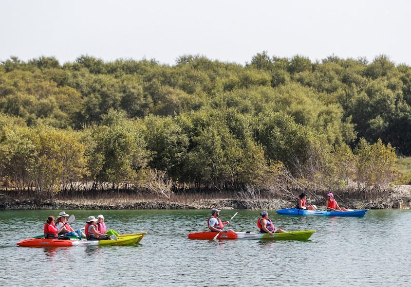 Abu Dhabi, UAE,  April 15, 2018.  Stand alone images at the Eastern Mangroves Promenade.   "Vive la France".   French tourists set off for a kayaking trip through the mangroves.
Victor Besa / The National
National
For:  Jake Badger
