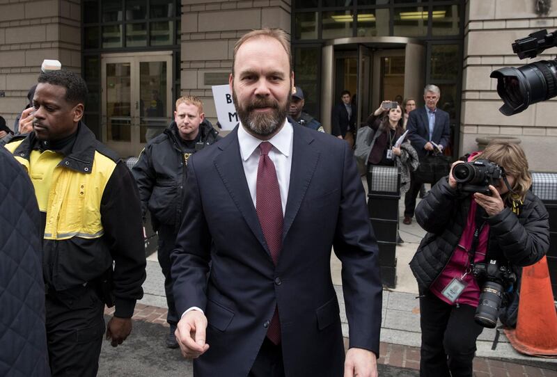 epa06558858 Former associate to former Trump campaign manager Paul Manafort, Rick Gates (C) departs the Federal Courthouse in Washington, DC, USA, 23 February 2018. Gates pleaded guilty to conspiracy against the United States and lying to investigators, indicating he is cooperating with the investigation into Russia's alleged meddling in the 2016 presidential election. Gates and Manafort face dozens of new charges that were unsealed in Alexandria, Virginia on 22 February.  EPA/MICHAEL REYNOLDS